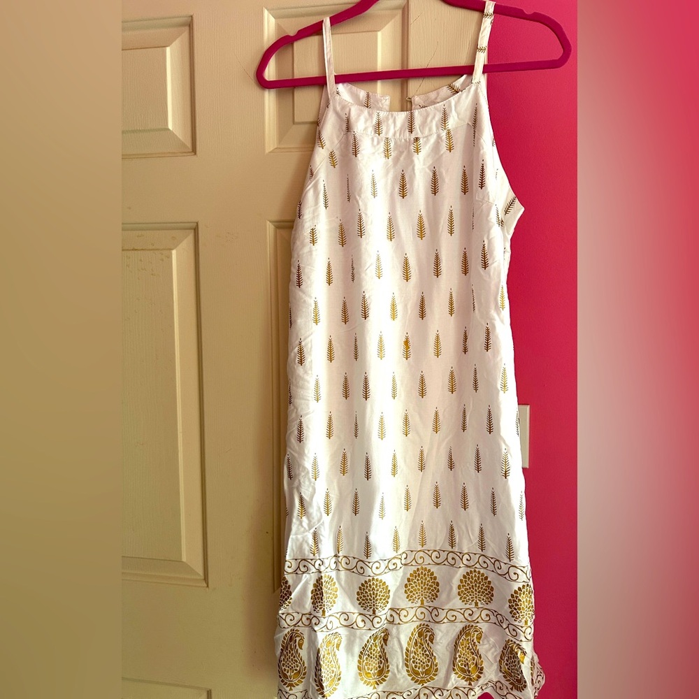 Never worn lined shift dress. Slight metallic bronze design.